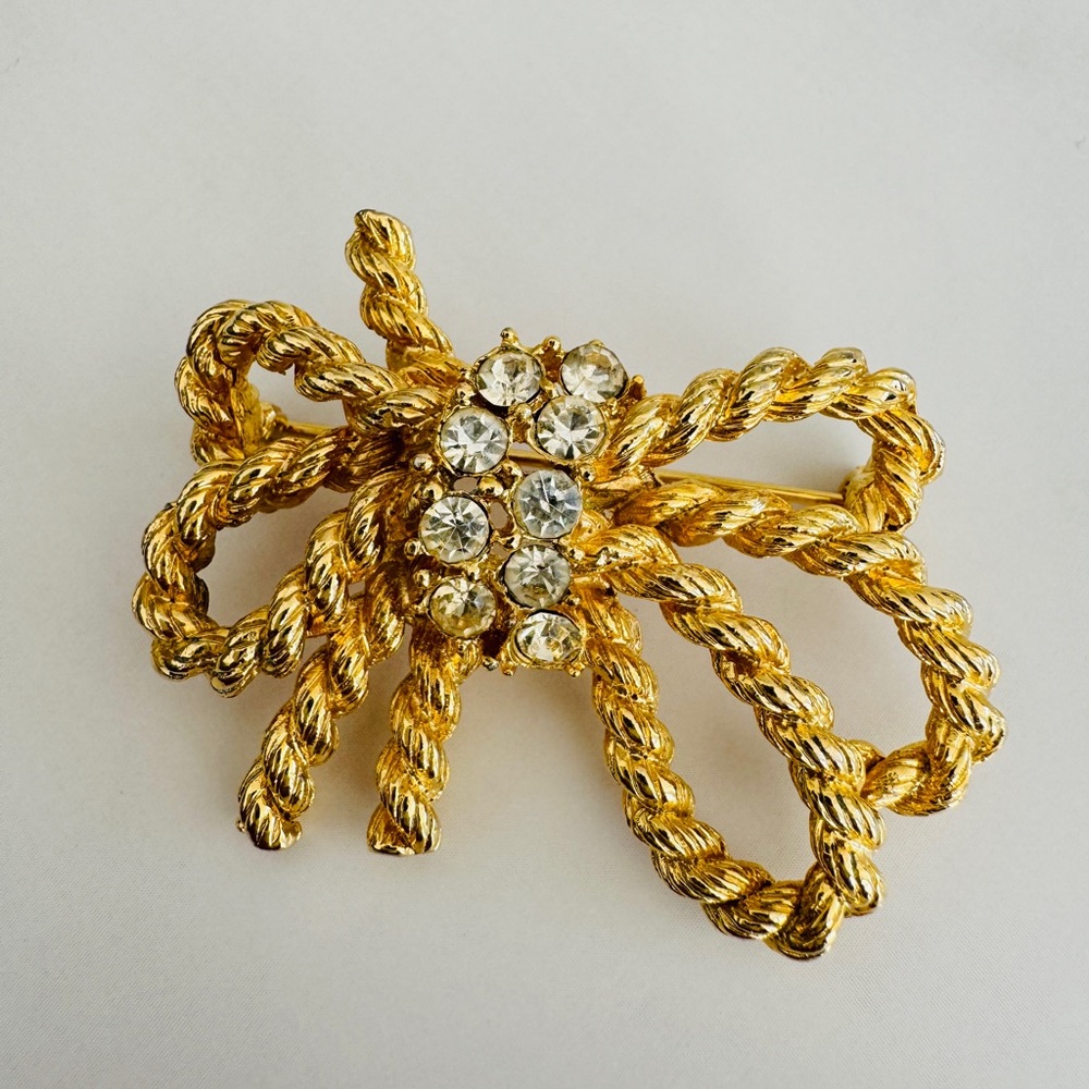 M. Jent Signed Bow Brooch Gold Tome with Clear Rhinestones